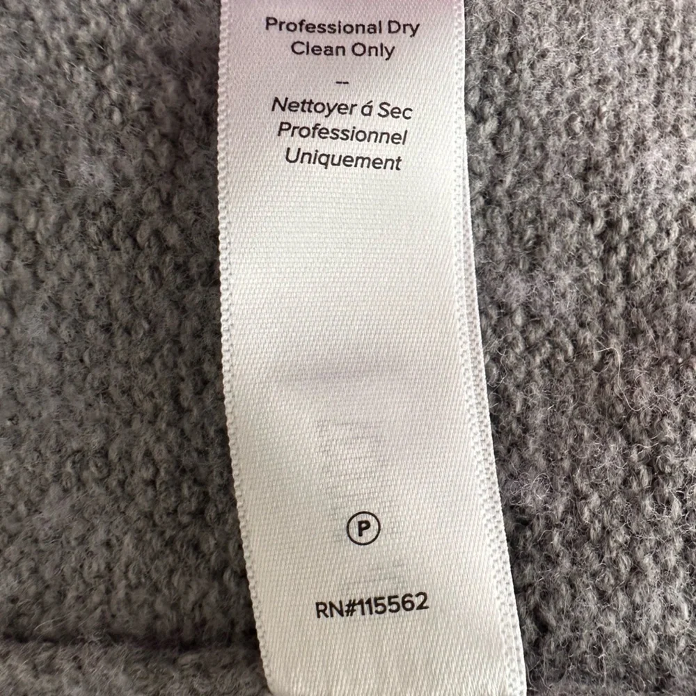 Cinq à Sept
Imitation Pearl Necklace Detail Long Sleeve
Layered Sweater Dress - Picture 10 of 10